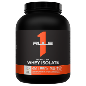 Black protein powder tub with an orange label The label reads R1 Protein Whey Isolate Vanilla Crème
